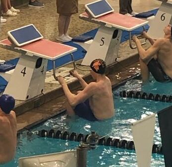 boy ready to swim race